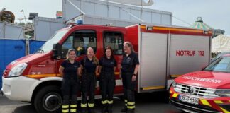 Brandsicherheitsdienst auf dem Bienenmarkt in weiblicher Hand