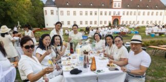Weißes Dinner in Heusenstamm: Schlemmen, feiern und funkeln im Schlosspark