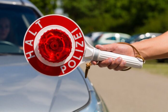 Police,-,Policeman,Or,Cop,In,Uniform,Stop,Car,In
